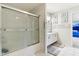 Bright bathroom featuring vanity with framed mirror, walk-in shower, and tile flooring at 1750 Quiet Haven Cir, Indianapolis, IN 46229