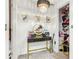 Bedroom with makeup vanity, decorative wall art, and closet access at 1750 Quiet Haven Cir, Indianapolis, IN 46229