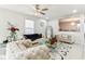 Bright living room with neutral walls, large window, and stylish furniture arrangement at 1750 Quiet Haven Cir, Indianapolis, IN 46229