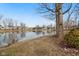 Scenic view of the pond behind the property, offering a tranquil and picturesque setting at 1750 Quiet Haven Cir, Indianapolis, IN 46229