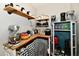 Well-organized butler's pantry with wooden shelves, butcher block counters and lots of storage at 19 Orchard Ln, Anderson, IN 46011