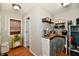 Butler's pantry with butcher block countertops, wooden shelves, and ample storage at 19 Orchard Ln, Anderson, IN 46011