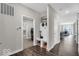 Mudroom with bench, laundry, and access to dining room at 19499 Mcbee Ave, Westfield, IN 46074