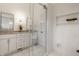 Elegant bathroom featuring a glass-enclosed shower and dual vanity sinks at 220 Pine Dr, Indianapolis, IN 46260