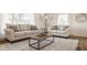 Cozy living room with modern furniture, lots of natural light, and a decorative area rug at 220 Pine Dr, Indianapolis, IN 46260