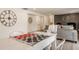 Living room view with a decorative fireplace and seating, showcasing modern design at 220 Pine Dr, Indianapolis, IN 46260