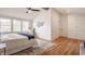 Main bedroom with vaulted ceilings, ample natural light, and built in storage at 220 Pine Dr, Indianapolis, IN 46260