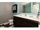 Bathroom with a double sink vanity, decorative mirror, and coordinated fixtures at 2336 Boneset Dr, Plainfield, IN 46168