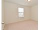 Bright bedroom with neutral walls, carpet, and a window providing natural light at 2336 Boneset Dr, Plainfield, IN 46168