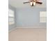 Light-filled bedroom with neutral walls and carpet, plus a large window for natural light at 2336 Boneset Dr, Plainfield, IN 46168