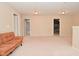 Expansive bonus room features neutral walls and carpet, with doorways to additional rooms at 2336 Boneset Dr, Plainfield, IN 46168