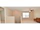 Cozy upstairs loft area with a window, carpet, and a comfortable sofa at 2336 Boneset Dr, Plainfield, IN 46168
