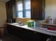 Functional kitchen featuring spacious countertop, cabinets, and natural lighting at 2860 S Meridian St, Indianapolis, IN 46225