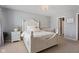 This elegant bedroom features a luxurious white bed, a cozy crib, and a stylish white nightstand at 2913 W Broderie Ln, Monrovia, IN 46157