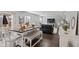 Open-concept dining area connected to the living room, featuring a stylish table and seating at 2913 W Broderie Ln, Monrovia, IN 46157
