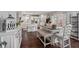 Spacious kitchen and dining area featuring modern decor and ample natural light from the sliding doors at 2913 W Broderie Ln, Monrovia, IN 46157