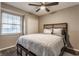 Cozy bedroom with a comfortable bed, closet, and natural light at 3278 Oceanline E Dr, Indianapolis, IN 46214