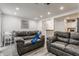 Bright living room with recessed lighting, modern furnishings, and an open floor plan at 3278 Oceanline E Dr, Indianapolis, IN 46214