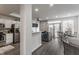Open concept kitchen, living and dining space with pond view at 3278 Oceanline E Dr, Indianapolis, IN 46214