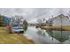 Waterfront view of townhomes with boat docks on a canal at 3278 Oceanline E Dr, Indianapolis, IN 46214
