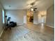 Inviting living room with vaulted ceiling, hard surface floors and neutral wall colors at 3408 Village Dr, Anderson, IN 46011
