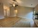 Bright and airy living room featuring hard surface floors and neutral wall colors at 3408 Village Dr, Anderson, IN 46011