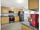 Functional kitchen equipped with stainless steel appliances, ample cabinet space, and a modern aesthetic at 3423 Shadow Bend Dr, Columbus, IN 47201