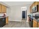 Bright, open kitchen with modern appliances, ample cabinet space, and views into other living areas at 3423 Shadow Bend Dr, Columbus, IN 47201