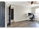 Office space with dark laminate floors and a desk with two computer monitors at 3423 Shadow Bend Dr, Columbus, IN 47201