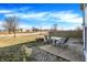 Cozy patio area with outdoor seating and brick fire pit, perfect for entertaining at 3423 Shadow Bend Dr, Columbus, IN 47201