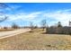 Serene view of the front yard and street, complemented by mature trees and a well-kept lawn at 3423 Shadow Bend Dr, Columbus, IN 47201