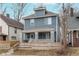 Charming two-story home with blue siding and a welcoming front porch at 3550 N Illinois St, Indianapolis, IN 46208