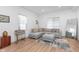 Bright living room with a modern sectional sofa and decorative accents at 3550 N Illinois St, Indianapolis, IN 46208