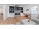 Cozy living room with fireplace, built-in shelves, and a stylish gray sectional at 3550 N Illinois St, Indianapolis, IN 46208