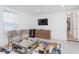Spacious living room with modern decor, stylish chairs, large rug, and comfortable sofa for relaxing and entertaining at 3550 N Illinois St, Indianapolis, IN 46208