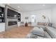 Modern living room featuring a fireplace, built-in shelves, and comfortable seating at 3550 N Illinois St, Indianapolis, IN 46208