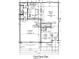 Detailed first floor plan of the home featuring a living room, kitchen, and garage at 3825 Windstar Way, Columbus, IN 47203