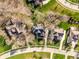 An aerial view showing the layout of the home and the manicured landscaping in a quiet neighborhood at 4243 Riverbirch Run, Zionsville, IN 46077