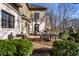 View of backyard with a patio table, trees, and mature landscaping at 4243 Riverbirch Run, Zionsville, IN 46077