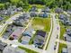 A neighborhood featuring multiple two-story homes with various colors, sidewalks, and green space at 5421 Upper Garden Way, Zionsville, IN 46077