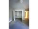 Bedroom with closet featuring shelves and rod, and neutral carpet at 5421 Upper Garden Way, Zionsville, IN 46077