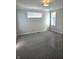 Spacious bedroom with soft carpet, bright windows, and neutral paint, ready for personalization at 5421 Upper Garden Way, Zionsville, IN 46077
