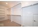 Spacious walk-in closet with ample shelving and hanging space, offering organized storage solutions at 5421 Upper Garden Way, Zionsville, IN 46077