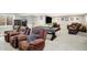 Basement featuring a seating area, billiard table, and a large window allowing in natural light at 5683 Oakmont Blvd, Bargersville, IN 46106