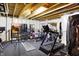 Spacious basement gym featuring a treadmill, free weights, and exercise equipment at 5683 Oakmont Blvd, Bargersville, IN 46106