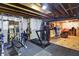 Spacious basement gym featuring a treadmill, free weights, and exercise equipment at 5683 Oakmont Blvd, Bargersville, IN 46106