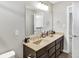 Bathroom boasts a double sink vanity with granite countertops and modern fixtures at 5683 Oakmont Blvd, Bargersville, IN 46106