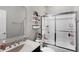 Bathroom with a large vanity, toilet, and shower and a sliding glass door at 5683 Oakmont Blvd, Bargersville, IN 46106