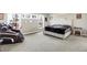 Relaxing bedroom with an oversized massage chair and bright natural light at 5683 Oakmont Blvd, Bargersville, IN 46106