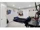 Cozy bedroom featuring wall decor, comfortable bed, and a functional desk setup at 5683 Oakmont Blvd, Bargersville, IN 46106